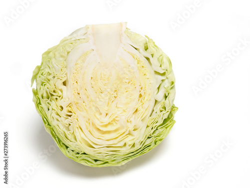 Cut green cabbage on white background © zah108
