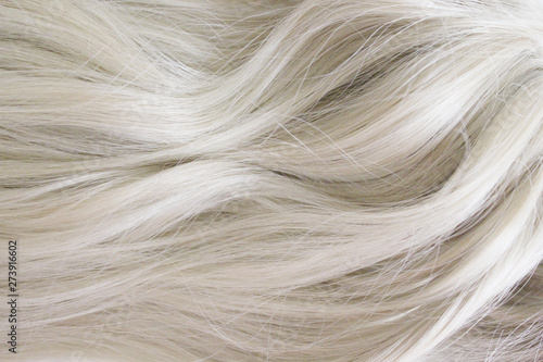 Beautiful hair. Long curly blonde hair. Color in light ash blonde.