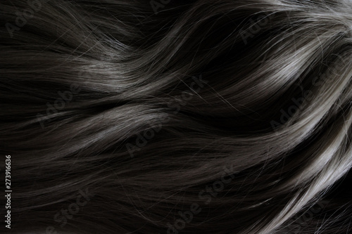 Beautiful hair. Long curly dark hair. Staining in dark color.