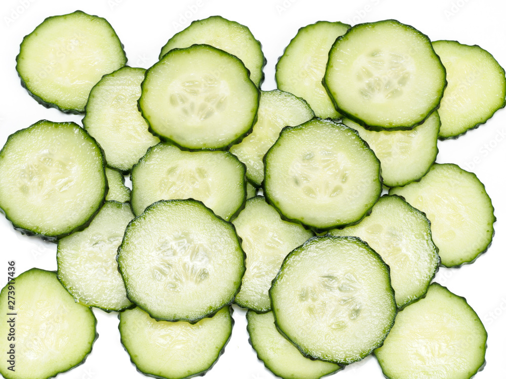 Sliced cucumbers on white background Sliced cucumbers on white background
