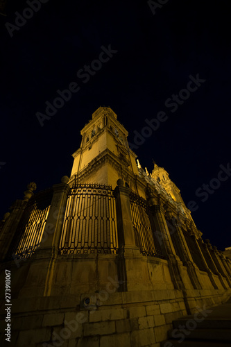 Jaen cathedral illuminated at night. Summery image with the empty streets of the city of Jaen in Spain photo