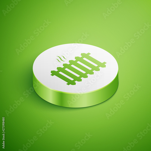Isometric Heating radiator icon isolated on green background. White circle button. Vector Illustration
