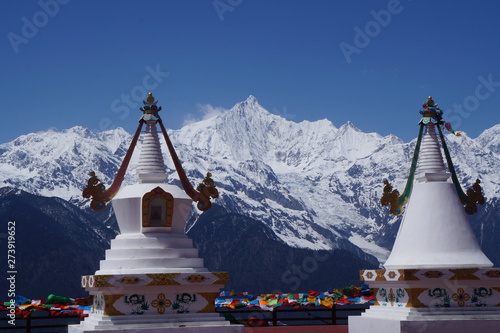 Views of the Meili Snow Mountain magic peaceful Tibetan place from Deqen photo