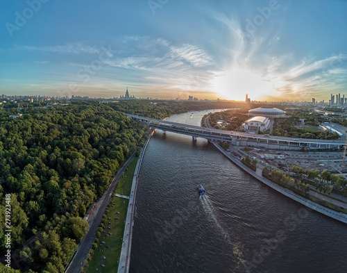 Luzhniki stadium, Moscow river and metro bridge on Sparrow Hills - Vorobyovy Gory, at sunset in Moscow, Russia. Aerial
