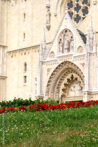 Flowers in front of Cathedral of the Assumption of the Blessed Virgin Mary, landmark in Zagreb, Croatia. Selective focus.