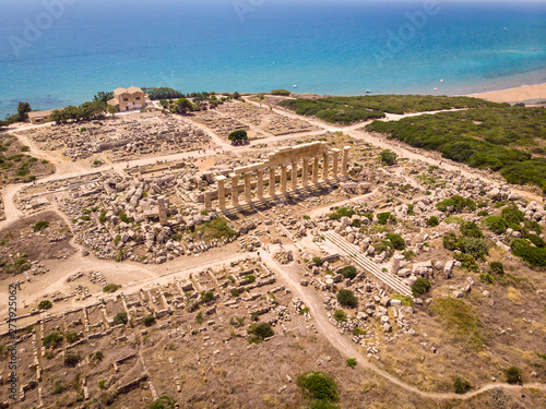 Aerial view of Greek ruins overlooking the sea  at the archeological site of Selinunte, Castelvetrano, Trapani,  on the coast of Sicily, Italy photo
