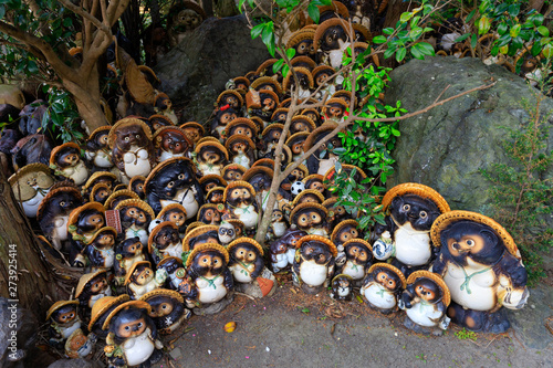 Group of Tanuki statues photo