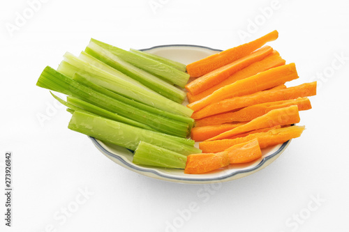 isolated carrots and celery plate