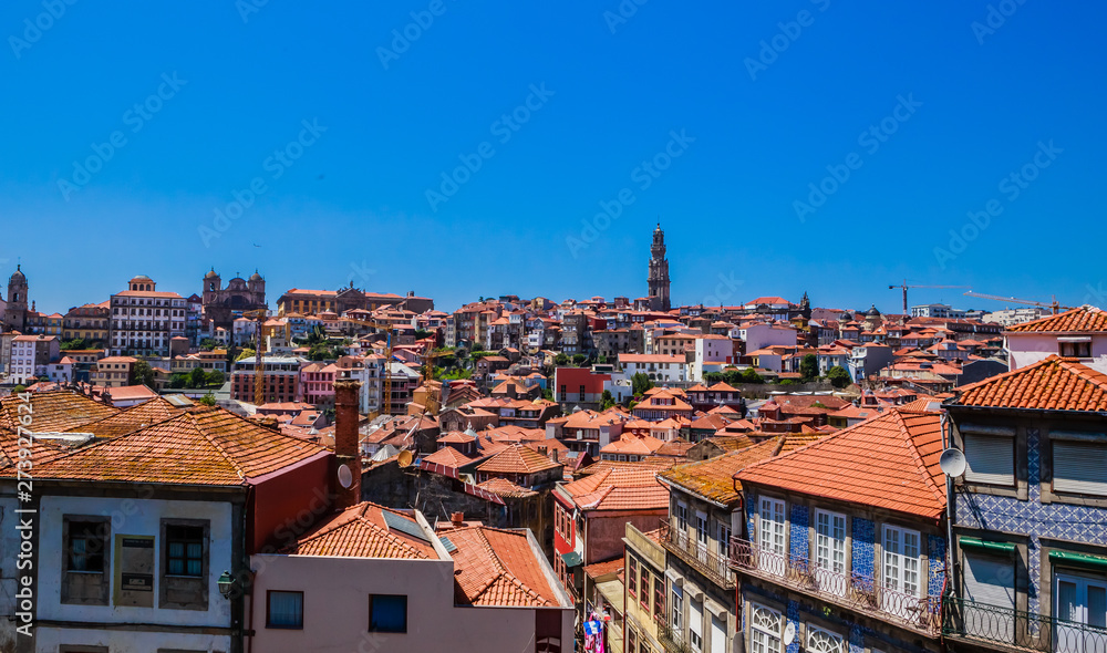 View over the rooftops of the city from the Cathedral, looking towards the Clerigos Tower, Porto, Portugal