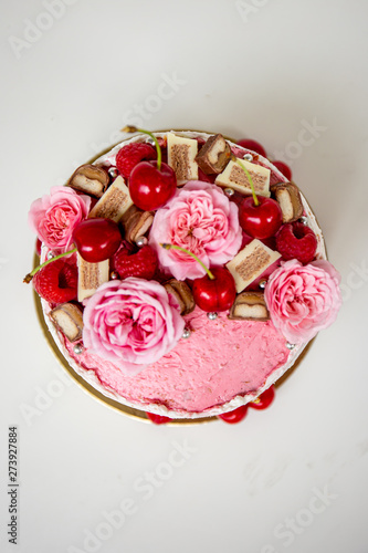 cake with roses on white background