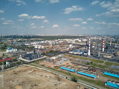 Moscow oil refinery in Kapotnya district, Russia. Industrial pipes and tanks of oil refinery factory. Aerial drone view