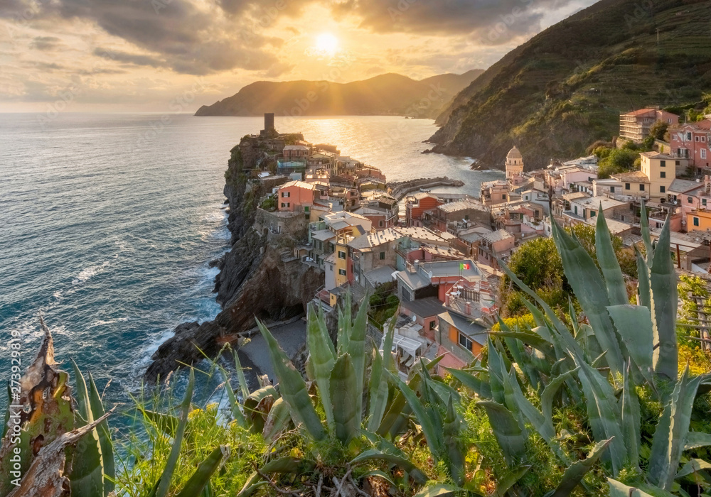 View of the beautiful sunset seaside of Vernazza village in summer in the Cinque Terre area