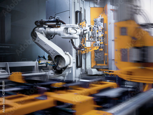 Industrial robot in modern factory photo