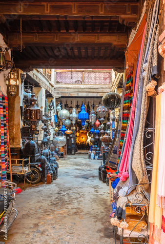 Street of Marrakech market with traditional souvenirs, Morocco