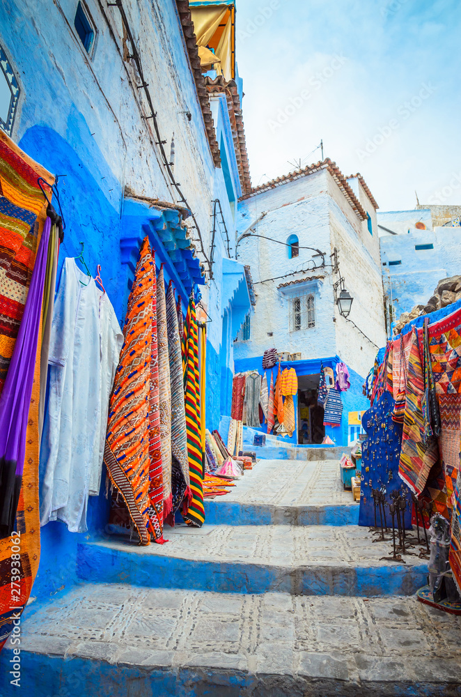 Street market in blue medina of city Chefchaouen, Morocco, Africa.