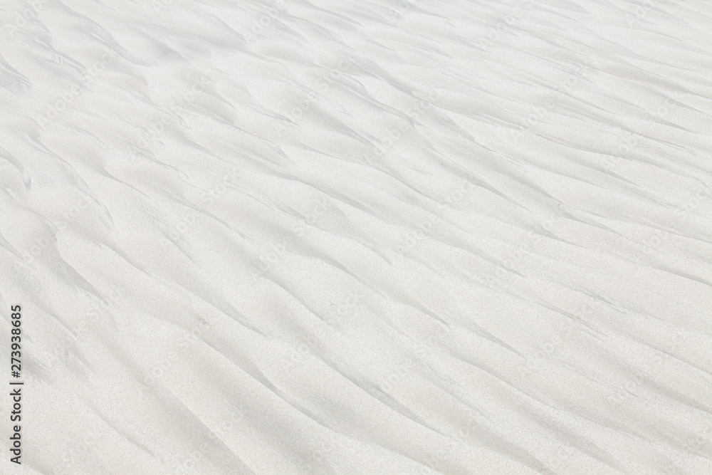 Wave patterns on white beach sand Wave patterns on white beach sand