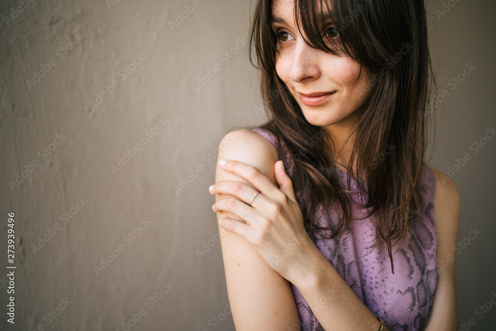 beautiful young girl in dress is resting outdoors, woman is walking on the street beautiful young girl in dress is resting outdoors, woman is walking on the street