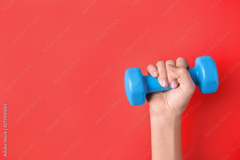 Woman holding vinyl dumbbell on color background, closeup with space for text - obrazy, fototapety, plakaty 