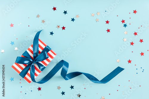 4th of July American Independence Day. Happy Independence Day, card on blue background. Flat lay, top view, copy space