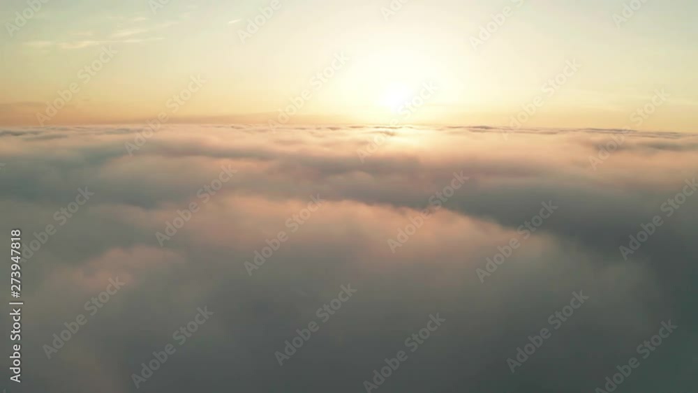 Beautiful misty dawn. Flying above the clouds, drone video Beautiful misty dawn. Flying above the clouds, drone video