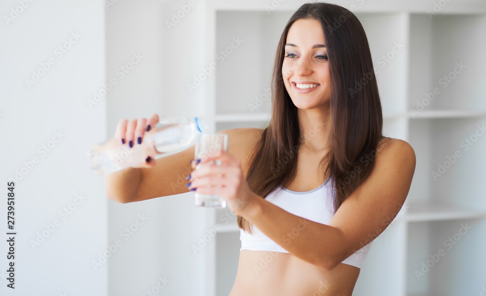Beautiful smiling woman drink glass water in the morning Beautiful smiling woman drink glass water in the morning