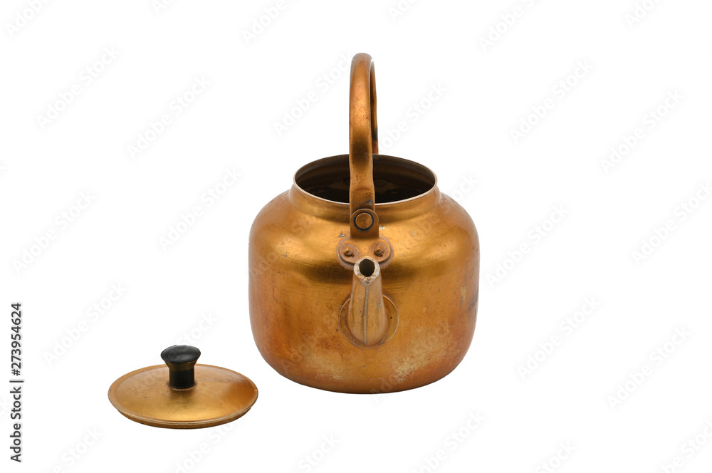 Golden metal kettle on a white background.Teapot. Golden metal kettle on a white background.Teapot.