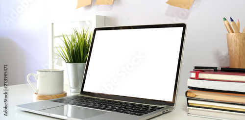 Wallpaper Mural Laptop computer on table in  office workspace. Torontodigital.ca