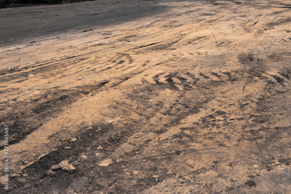 Construction pavement with many wheel prints Construction pavement with many wheel prints