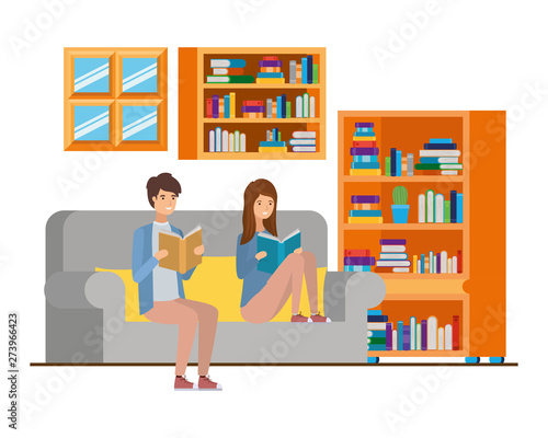 Fototapeta Naklejka Na Ścianę i Meble -  couple with book in hands in living room