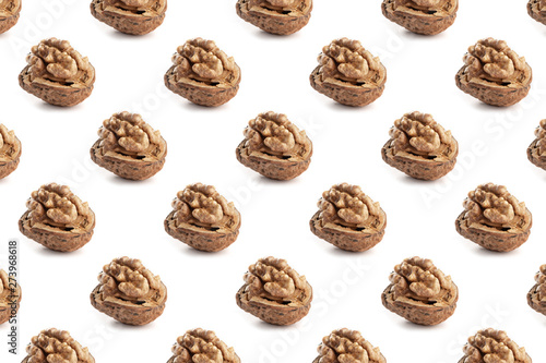 Pattern large walnuts on white background