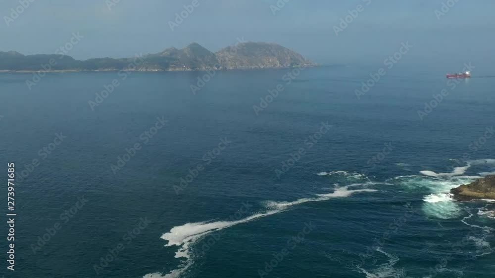 Wonderful sea of northern Spain in winter with the islands in the background Wonderful sea of northern Spain in winter with the islands in the background