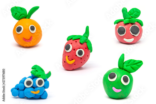 Play dough Fruit imitation on white background. Handmade clay plasticine