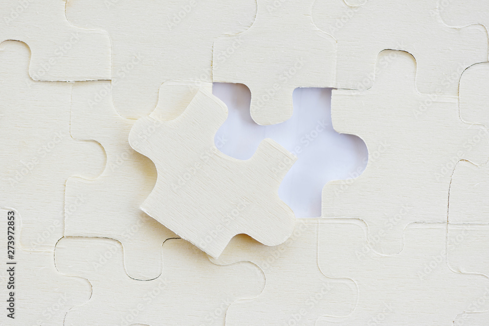 Jigsaws puzzles on white /Jigsaw pieces on texture Jigsaws puzzles on white /Jigsaw pieces on texture