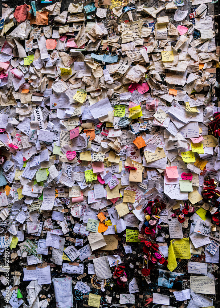 Love notes on a wall in Verona, Italy