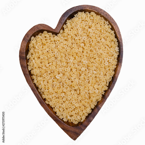 Dry pasta in a bowl photo