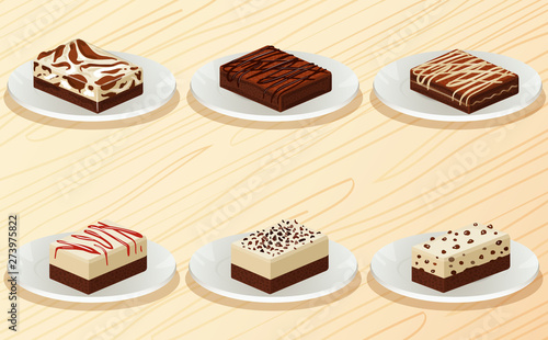 brownie in the plate on the wooden table