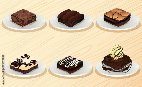 brownie in the plate on the wooden table