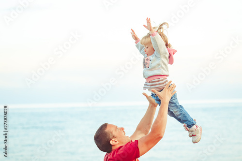 dad picks up the child
