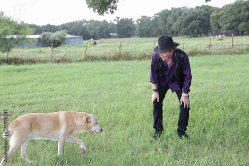 A man and his dog, outside Springtown, Texas