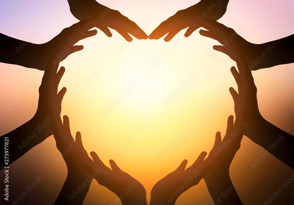 International Day of Friendship concept: hands in shape of heart on blurred  background - obrazy, fototapety, plakaty 
