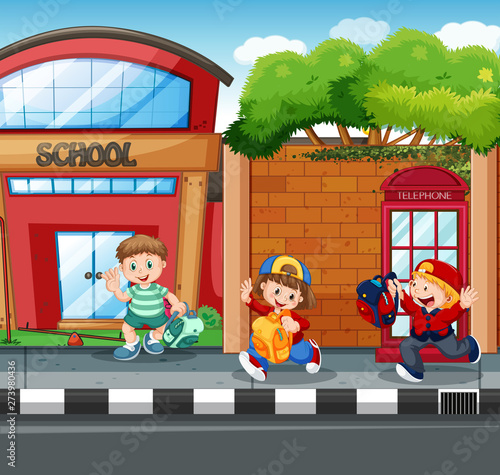 Student in front of school