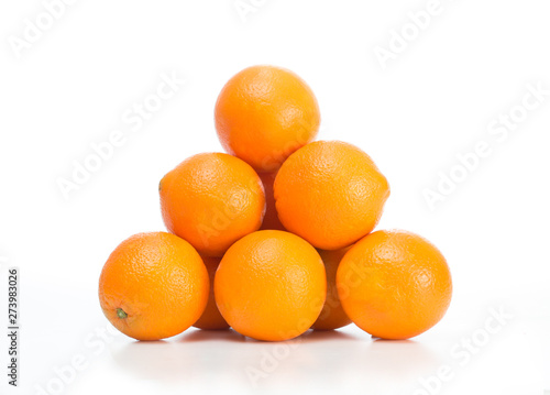Oranges arranged in a pyramid