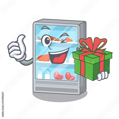 With gift refrigerator in the a cartoon shape