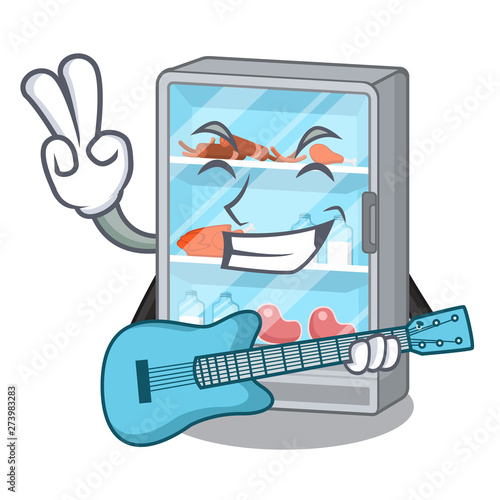 With guitar refrigerator in the a cartoon shape