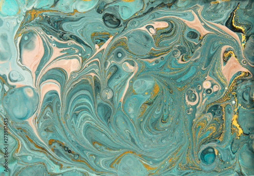 Blue and gold marbling pattern. Golden marble liquid texture.