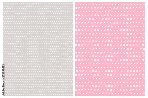 Fototapeta Naklejka Na Ścianę i Meble -  2 Simple Abstract Cross Sign Vector Patterns. White Irregular Brush Crosses on a Pink and Light Gray Backgrounds. Funny Hand Drawn Geometric Repeatable Design. Irregular Infantile Style Check Marks.