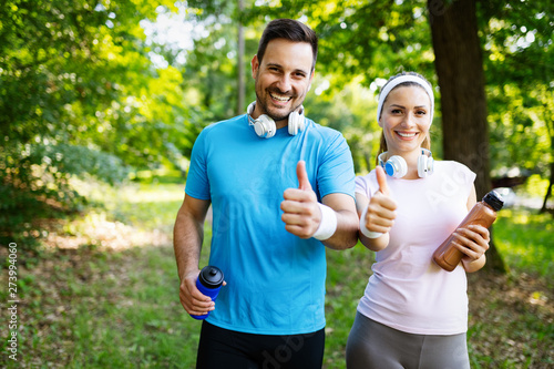 Fototapeta Naklejka Na Ścianę i Meble -  Fitness training for couple in love outside