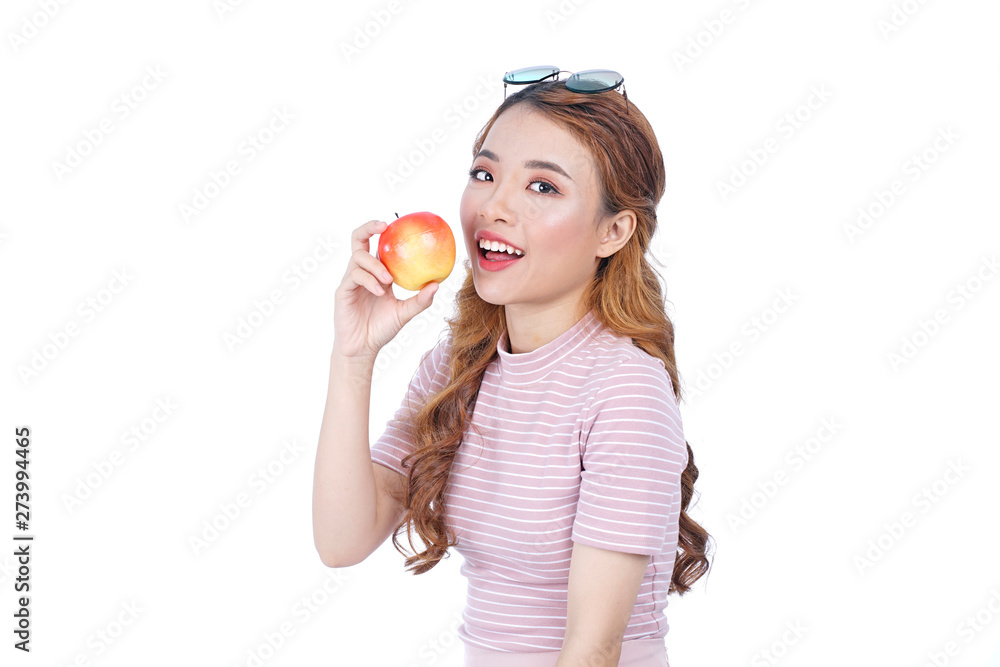 Asian young healthy beautiful attractive pretty girl with red apple on white background Asian young healthy beautiful attractive pretty girl with red apple on white background