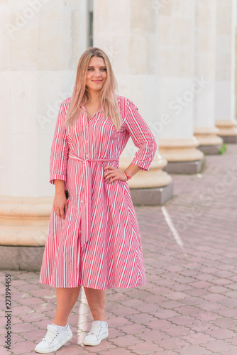 Wallpaper Mural Plus size model in cotton dress at street. Girl at warm summer days , concept of fashion for ladies Torontodigital.ca