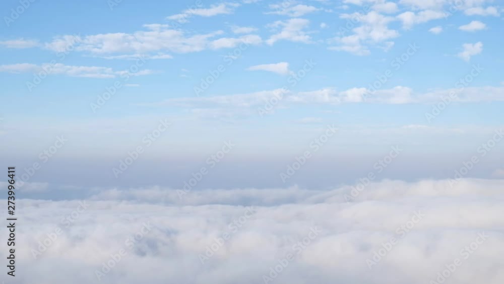 Morning fog and fluffy clouds flowing quickly through the mountain. Morning fog and fluffy clouds flowing quickly through the mountain.